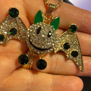 Green and white bat necklace